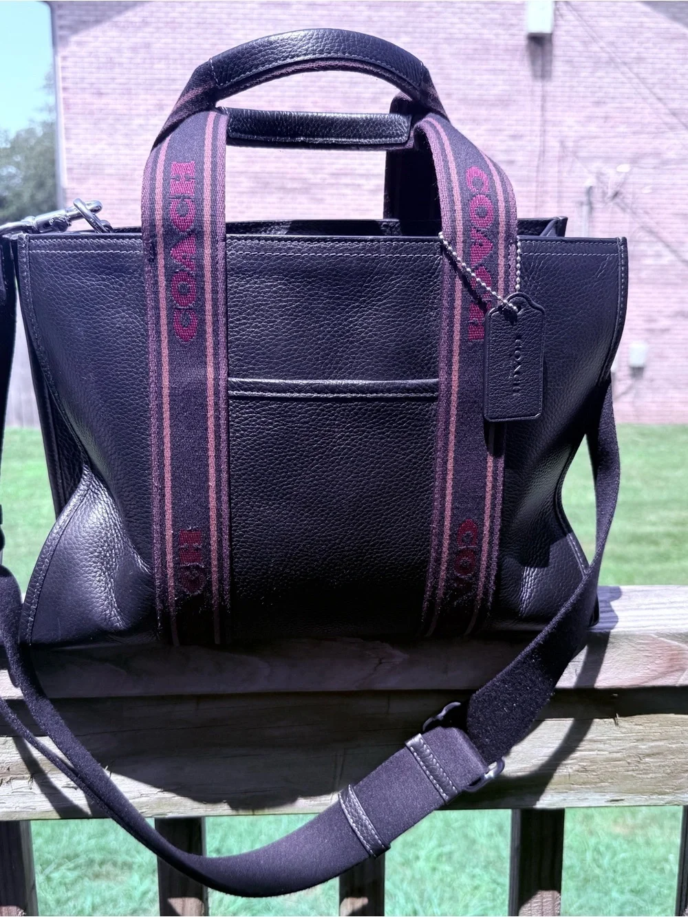 Coach Black Pebbled Leather Tote with Burgundy Logo Straps